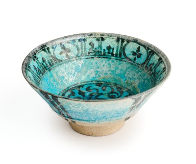 Lot 162 - A KASHAN BLACK PAINTED TURQUOISE BOWL, PERSIA, 12TH/13TH CENTURY