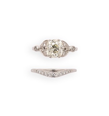 Lot 664 - DIAMOND RING AND BAND RING