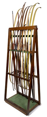 Lot 69 - A FOLDING CONTINENTAL ARCHERY STAND WITH SIXTEEN CONTINENTAL BOWS, EARLY 20TH CENTURY