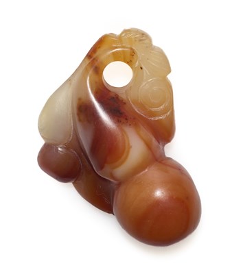 Lot 79 - A CHINESE CORNELIAN AGATE TOGGLE, QING DYNASTY (1644-1911)