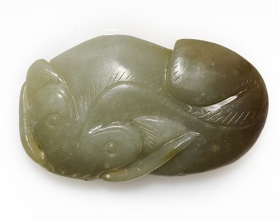 Lot 76 - A CHINESE CARVED CELADON AND RUSSET JADE CAT FISH, QING DYNASTY (1644-1911)