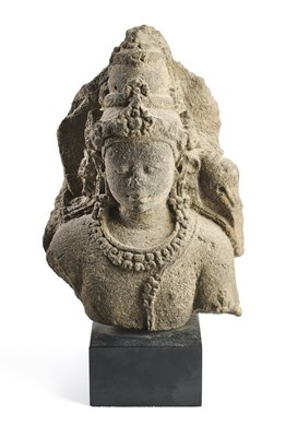 Lot 257 - A JAVANESE FRAGMENTARY ANDESITE BUST OF VISHNU, PROBABLY MID-9TH CENTURY