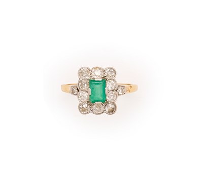 Lot 597 - EMERALD AND DIAMOND CLUSTER RING, 1920s
