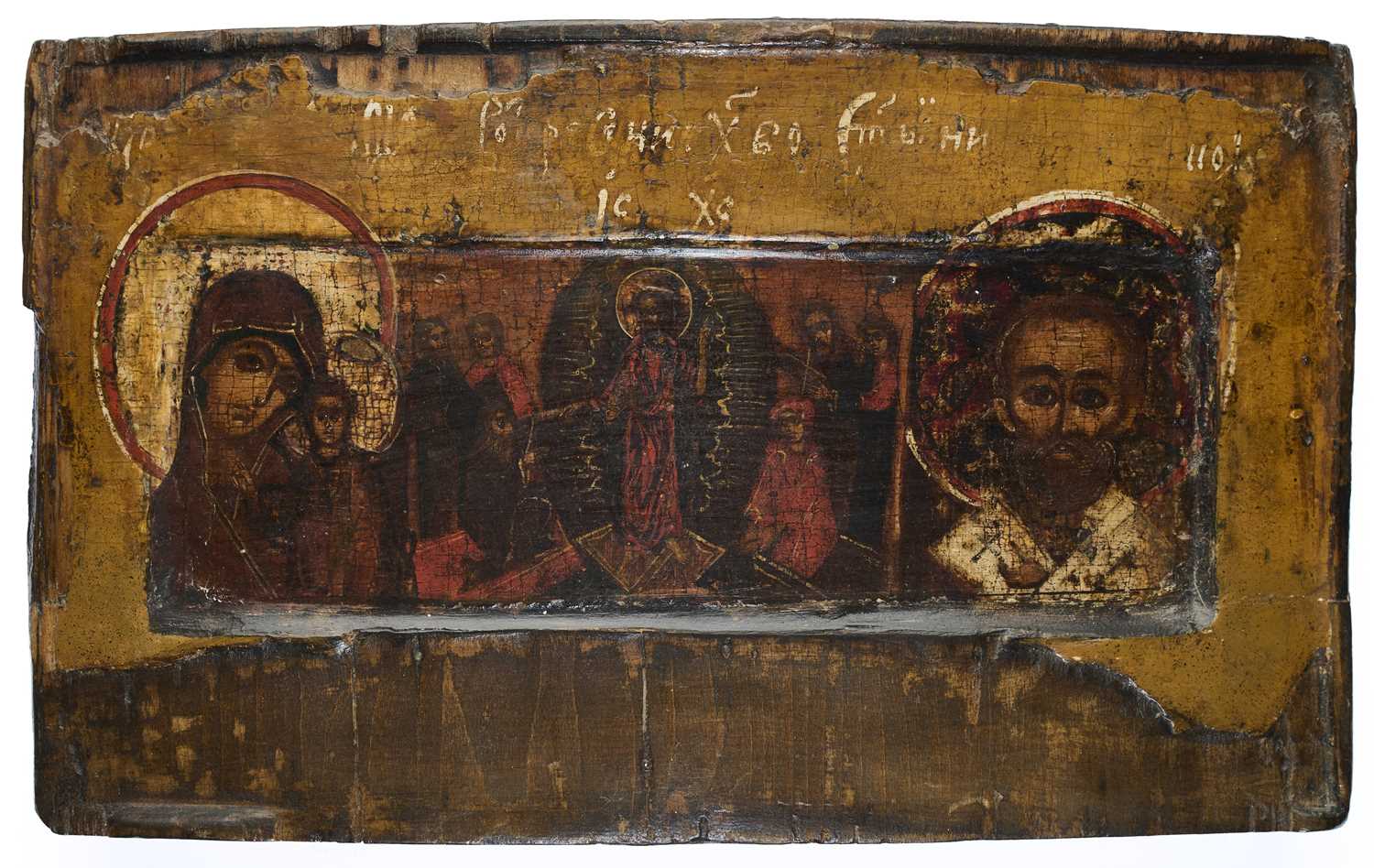 Lot 38 - AN ICON DEPICTING THE VIRGIN OF KAZAN; DESCENT INTO HELL, AND SAINT NICHOLAS, RUSSIAN, CIRCA 1700