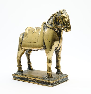 Lot 33 - A BRASS FIGURE OF A HORSE, WESTERN DECCAN, INDIA, 17TH/18TH CENTURY