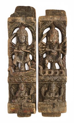 Lot 159 - TWO CARVED AND PAINTED ARCHITECTURAL STRUTS, NEPAL, CIRCA 17TH CENTURY