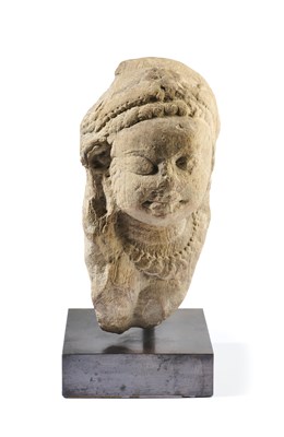 Lot 177 - A BUFF SANDSTONE FRAGMENTARY FEMALE BUST, CENTRAL INDIA, 8TH/9TH CENTURY