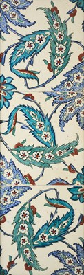 Lot 112 - AN IZNIK PANEL OF THREE TILES, OTTOMAN ANATOLIA, CIRCA 1600