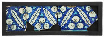 Lot 133 - THREE FRAGMENTARY DIYARBAKIR BORDER TILES, SOUTHERN ANATOLIA, SECOND HALF 16TH CENTURY