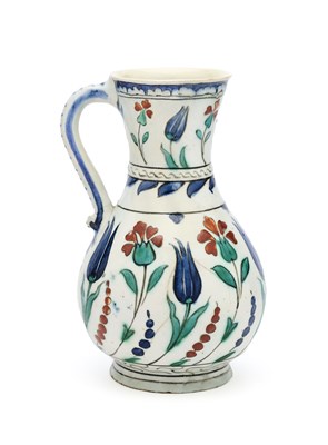 Lot 111 - AN IZNIK POTTERY JUG, OTTOMAN ANATOLIA, CIRCA 1600