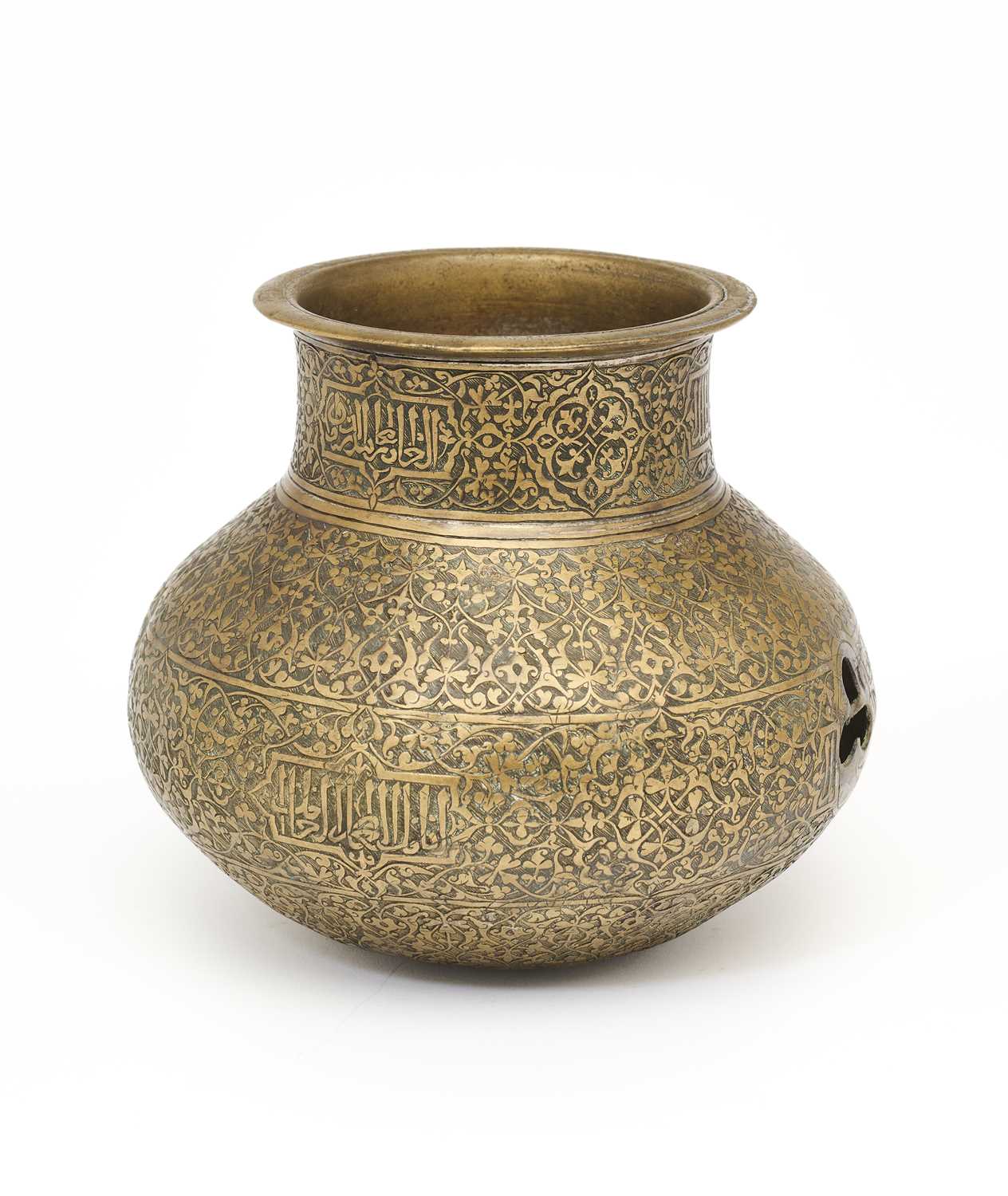 Lot 94 - AN ENGRAVED BRASS EWER, PROBABLY DECCAN, SOUTHERN INDIA, CIRCA 1500