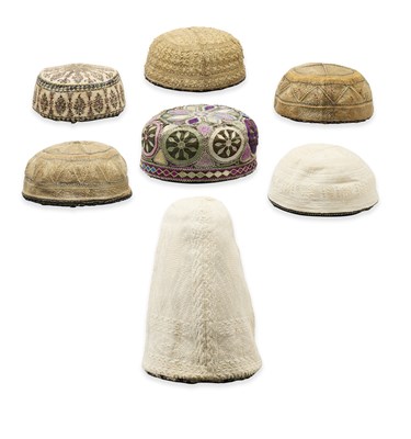 Lot 227 - A COLLECTION OF MUSLIM HATS, TURKEY, IRAN AND SOUTH ASIA, 19TH-20TH CENTURY