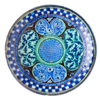 Lot 174 - A CENTRAL ASIAN POTTERY DISH, PROBABLY KOKAND, UZBEKISTAN, 19TH CENTURY