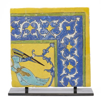 Lot 137 - A SAFAVID CUERDA SECA TILE DEPICTING AN ANGEL, PERSIA, 17TH CENTURY