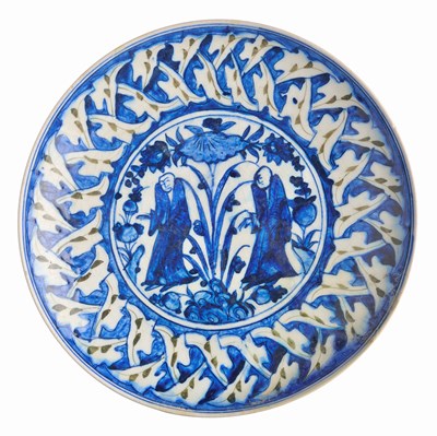 Lot 131 - A SAFAVID CHINOISERIE BLUE AND WHITE CHARGER, CIRCA 1700