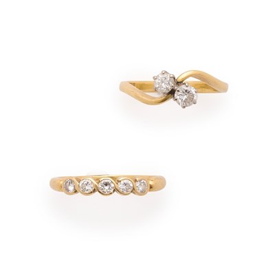 Lot 715 - TWO GOLD AND DIAMOND RINGS