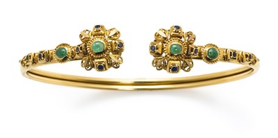 Lot 733 - ILIAS LALAOUNIS: EMERALD AND SAPPHIRE TORQUE, 1970s