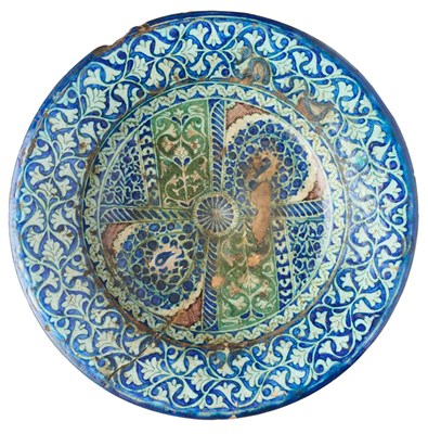 Lot 396 - A CENTRAL ASIAN POTTERY DISH, PROBABLY KOKAND, UZBEKISTAN, 19TH CENTURY