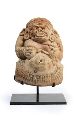 Lot 168 - A GUPTA TERRACOTTA TOY IN THE FORM OF A GRIMACING RAKSHASA, NORTHERN INDIA, 4TH/5TH CENTURY
