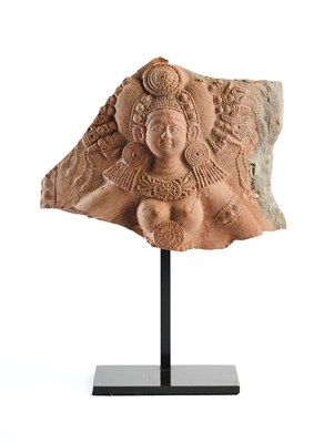 Lot 169 - A SUNGA FRAGMENTARY PLAQUE DEPICTING A YAKSHI, BENGAL, 1ST CENTURY B.C./1ST CENTURY A.D.