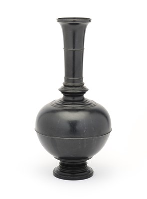 Lot 218 - A CARVED AND TURNED BLACK MARBLE SURAHI, NORTHERN INDIA, 19TH CENTURY