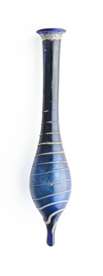Lot 52 - A ROMAN GLASS PHIAL, CIRCA 1ST CENTURY A.D.