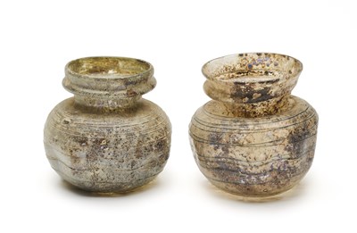 Lot 472 - A COLLECTION OF ROMAN GLASS VESSELS, 2ND-4TH CENTURY A.D.