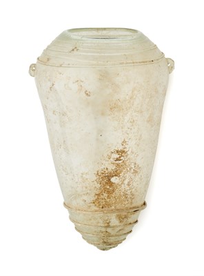 Lot 70 - A LATE ROMAN OR BYZANTINE COLOURLESS GLASS VESSEL, 4TH-6TH CENTURY A.D.