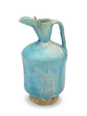 Lot 82 - A KASHAN TURQUOISE GLAZED EWER, PERSIA, 12TH/13TH CENTURY