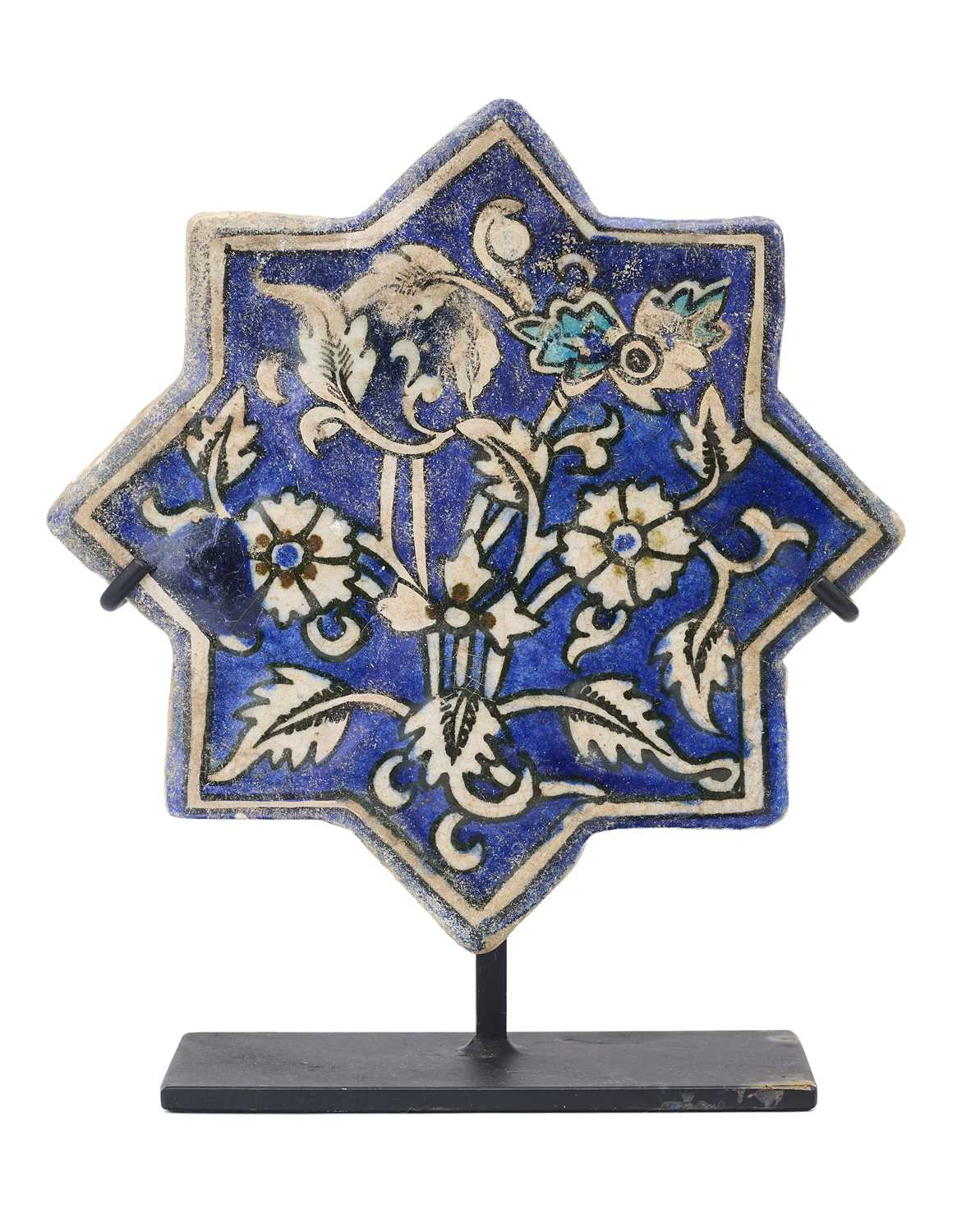 Lot 345 - AN ILKHANID STAR TILE, PERSIA, 14TH CENTURY