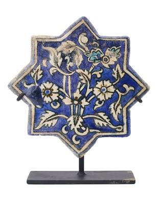 Lot 345 - AN ILKHANID STAR TILE, PERSIA, 14TH CENTURY