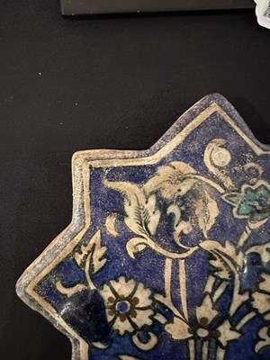 Lot 345 - AN ILKHANID STAR TILE, PERSIA, 14TH CENTURY