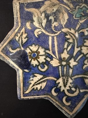 Lot 345 - AN ILKHANID STAR TILE, PERSIA, 14TH CENTURY