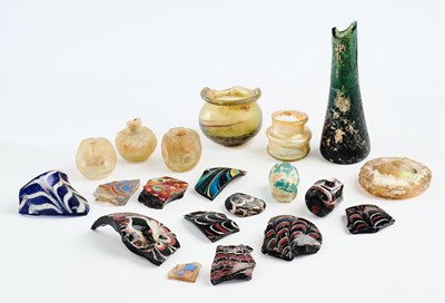Lot 229 - A COLLECTION OF ANCIENT AND ISLAMIC GLASS FRAGMENTS, 2ND-14TH CENTURIES A.D.