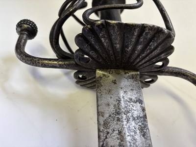 Lot 28 - A NORTH EUROPEAN BASKET-HILTED MILITARY BACKSWORD (TESSAK), LATE 16TH CENTURY