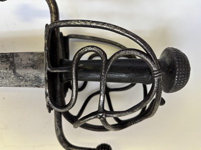 Lot 28 - A NORTH EUROPEAN BASKET-HILTED MILITARY BACKSWORD (TESSAK), LATE 16TH CENTURY