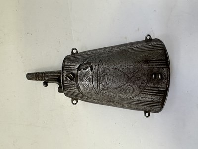 Lot 84 - AN ITALIAN PRIMING-FLASK FORMED ENTIRELY OF STEEL, LAST QUARTER OF THE 16TH CENTURY