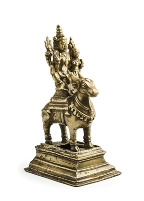 Lot 183 - A BRONZE FIGURE OF SIVA AND PARVATI RIDING ON NANDI BULL, WESTERN DECCAN, 19TH CENTURY