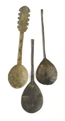 Lot 63 - THREE BYZANTINE BRONZE SPOONS, EASTERN MEDITERRANEAN, 6TH-9TH CENTURY A.D.