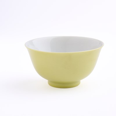 Lot 46 - A CHINESE YELLOW-GLAZED CUP