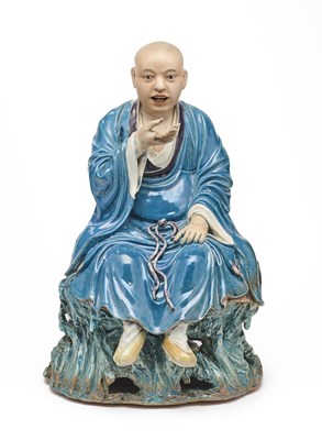 Lot 12 - A LARGE CHINESE BISCUIT AND GLAZED FIGURE OF A LUOHAN, ATTRIBUTED TO ZENG LONGSHENG, REPUBLIC PERIOD