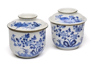 Lot 118 - A PAIR OF CHINESE BLUE AND WHITE POTICHE AND COVERS, QING DYNASTY, KANGXI PERIOD (1662-1722)