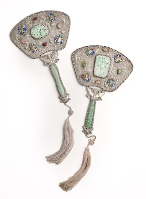 Lot 70 - A NEAR PAIR OF CHINESE JADEITE-INSET SILVER HAND MIRRORS, QING DYNASTY, 19TH CENTURY