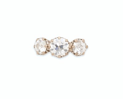 Lot 69 - DIAMOND THREE STONE RING, 1976