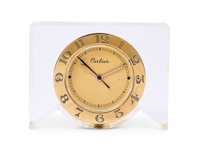 Lot 154 - CARTIER: A GOLD AND LUCITE DESK CLOCK, CIRCA 1950