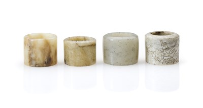 Lot 86 - FOUR CHINESE JADE ARCHERS RINGS, QING DYNASTY, 19TH CENTURY