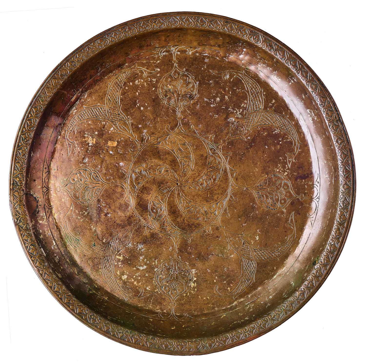 Lot 374 - AN ENGRAVED TINNED COPPER TRAY, PROBABLY DECCAN, INDIA, 17TH CENTURY
