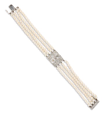 Lot 445 - PICKSLAY & CO: BELLE EPOQUE SEED PEARL AND DIAMOND BRACELET, 1900s