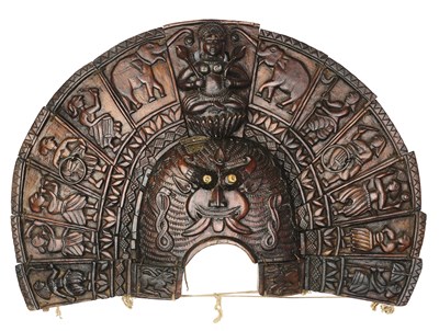 Lot 165 - A CARVED WOOD RITUAL HEADDRESS, KERALA, SOUTH-WESTERN INDIA, CIRCA 19TH CENTURY