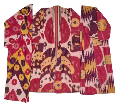 Lot 26 - AN IKAT MUNISAK AND TWO CHAPAN, BOKHARA, UZBEKISTAN, CIRCA 1900